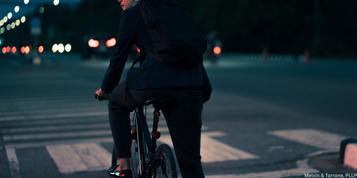 Police officer stopping cyclist to discuss DUI on bicycle laws in Washington