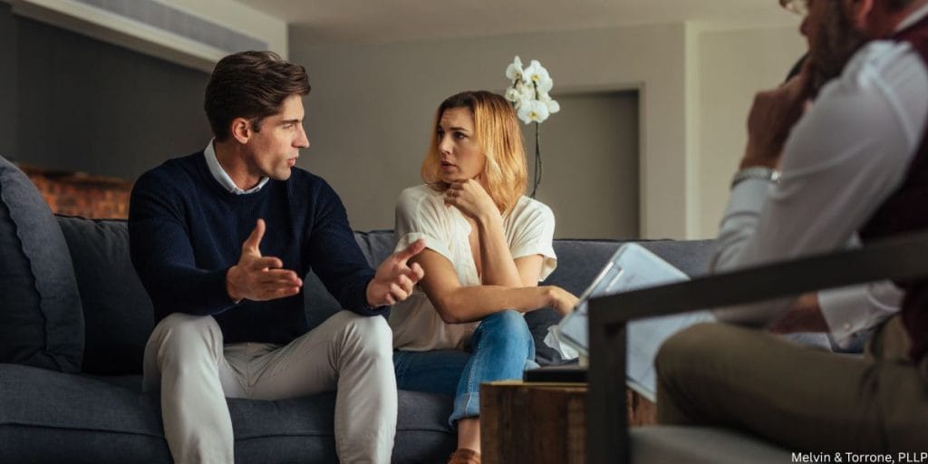Relationship counseling session helping couple rebuild trust after marital infidelity