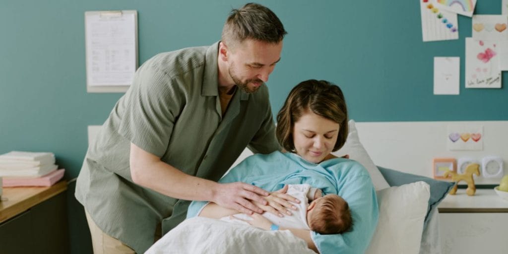 Parents signing paternity acknowledgment form to establish legal parentage in Washington